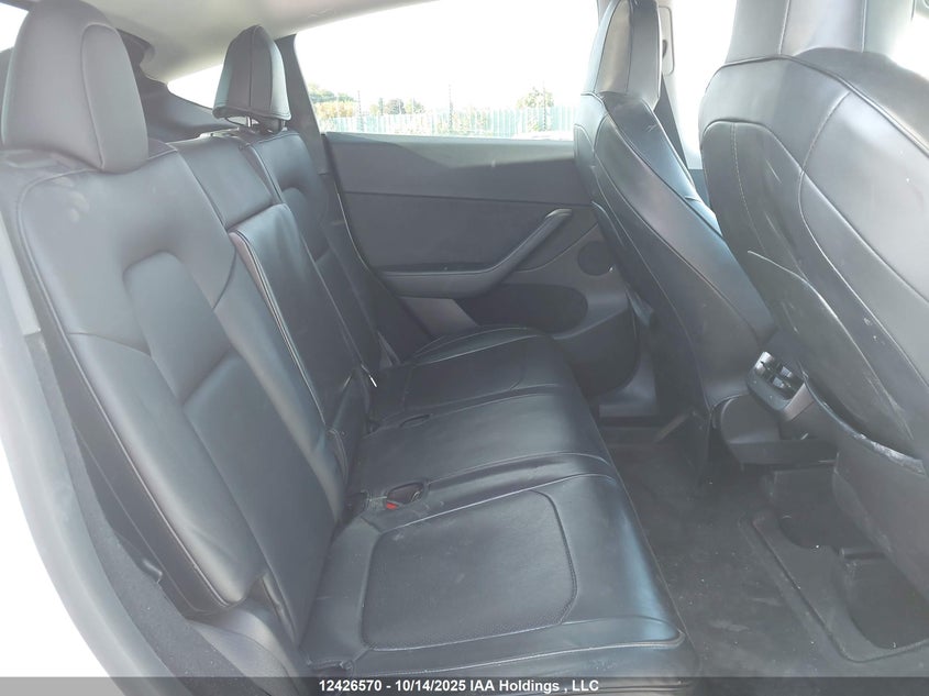 2023 Tesla Model Y VIN: 7SAYGDEE0PF772605 Lot: 12426570