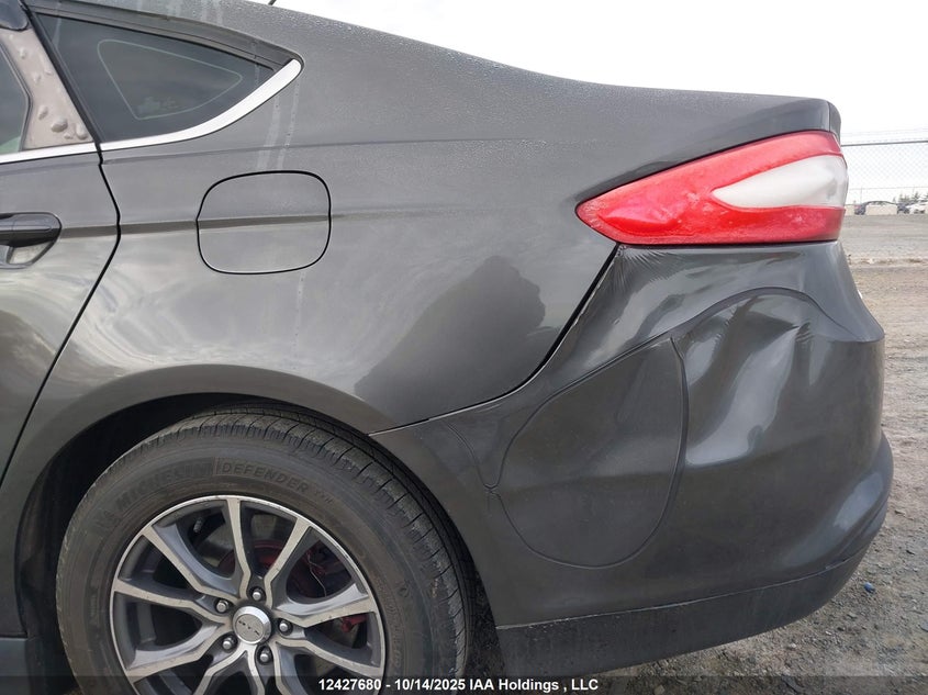 2015 Ford Fusion S VIN: 3FA6P0G70FR255061 Lot: 12427680