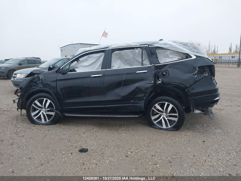 2018 Honda Pilot Touring VIN: 5FNYF6H98JB504080 Lot: 12428381