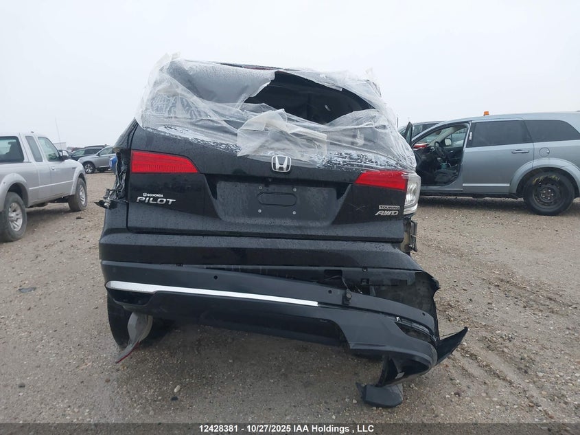 2018 Honda Pilot Touring VIN: 5FNYF6H98JB504080 Lot: 12428381