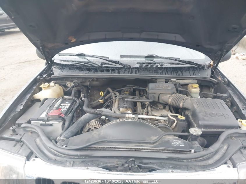 2003 Jeep Grand Cherokee Laredo VIN: 1J4GW4HS23C615883 Lot: 12429636