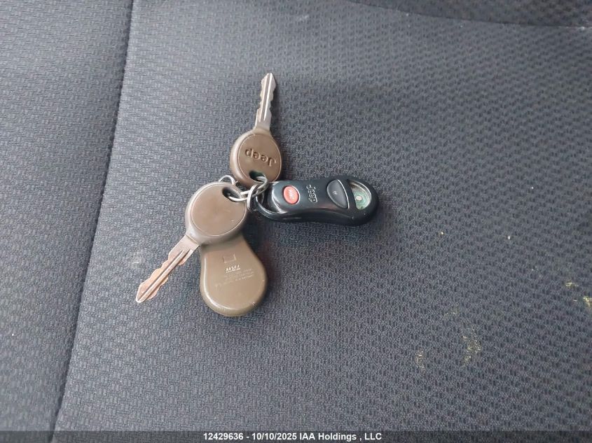 2003 Jeep Grand Cherokee Laredo VIN: 1J4GW4HS23C615883 Lot: 12429636