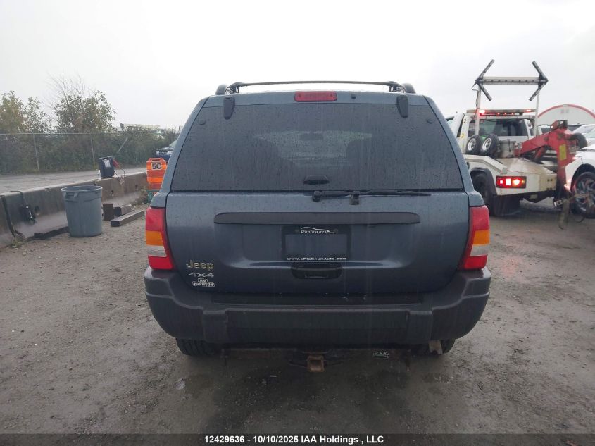 2003 Jeep Grand Cherokee Laredo VIN: 1J4GW4HS23C615883 Lot: 12429636