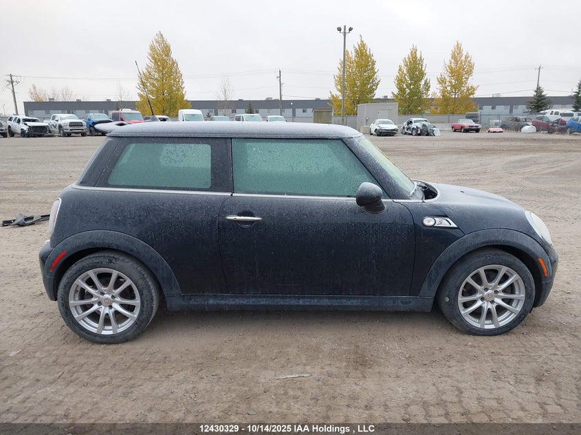 2007 Mini Cooper S VIN: WMWMF73567TL85263 Lot: 12430329