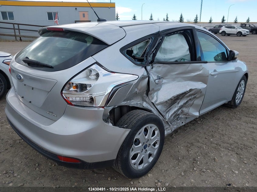 2014 Ford Focus Se VIN: 1FADP3K23EL376992 Lot: 12430491