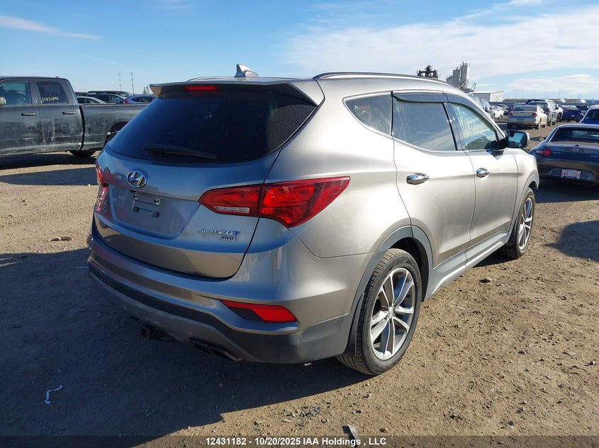 5NMZUDLAXJH082361 2018 HYUNDAI SANTA FE photo no. 4