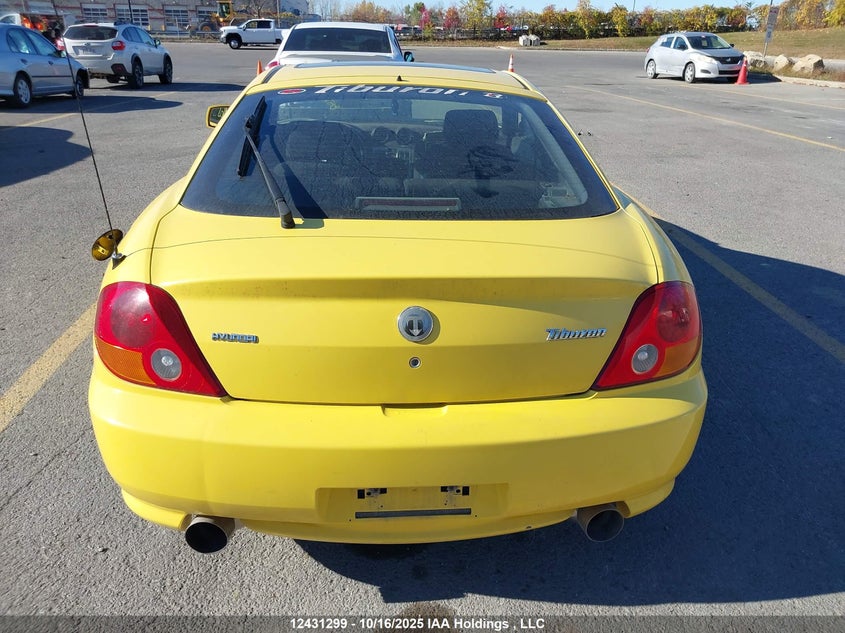 2003 Hyundai Tiburon VIN: KMHHN65F93U094165 Lot: 12431299