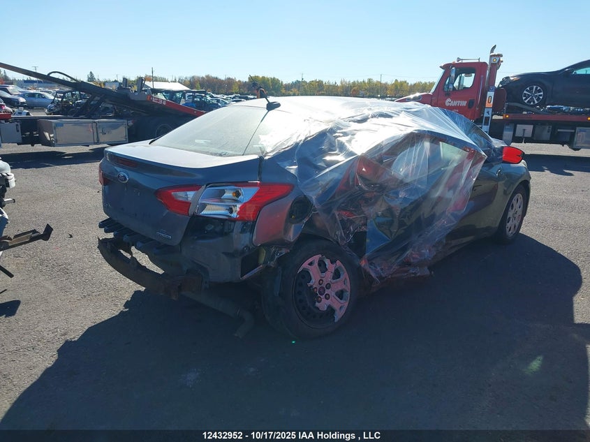 1FADP3F2XEL358290 2014 FORD FOCUS photo no. 4