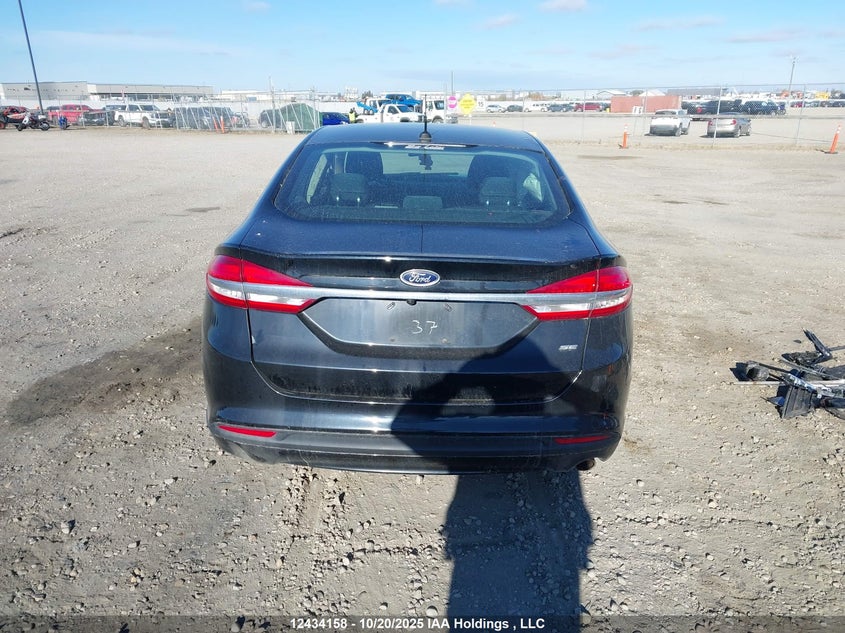 3FA6P0H73JR250802 2018 FORD FUSION photo no. 16
