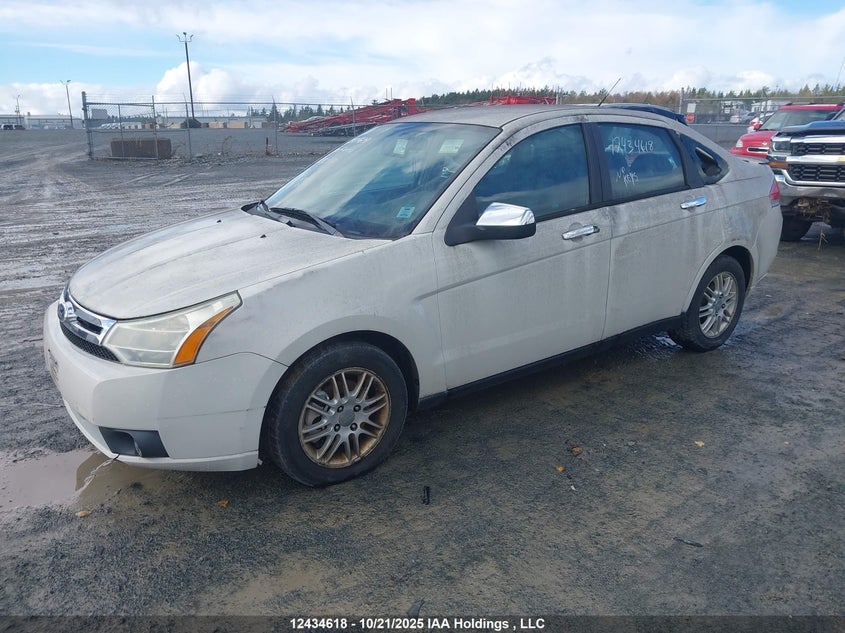 2010 Ford Focus, Theft Recovery, IAAI, VIN 1FAHP3FNXAW283854 — photo 2