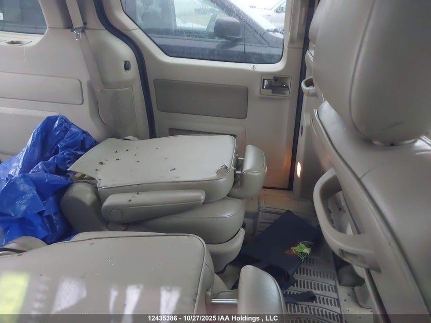 2004 Ford Freestar Sel VIN: 2FMZA56294BA03604 Lot: 12435386