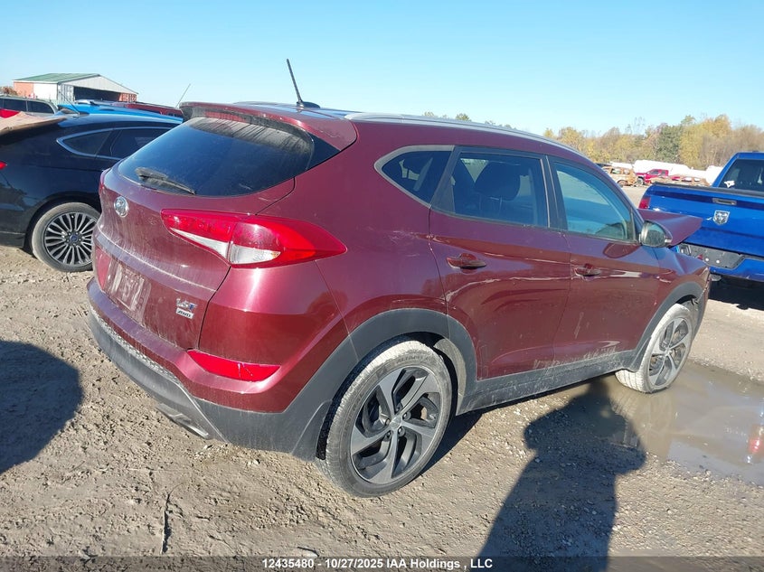 KM8J3CA22GU081627 2016 HYUNDAI TUCSON photo no. 4