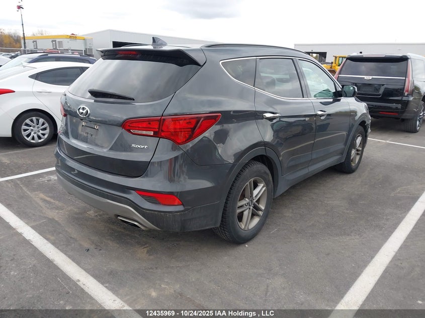 5XYZT3LB3HG479081 2017 HYUNDAI SANTA FE photo no. 4