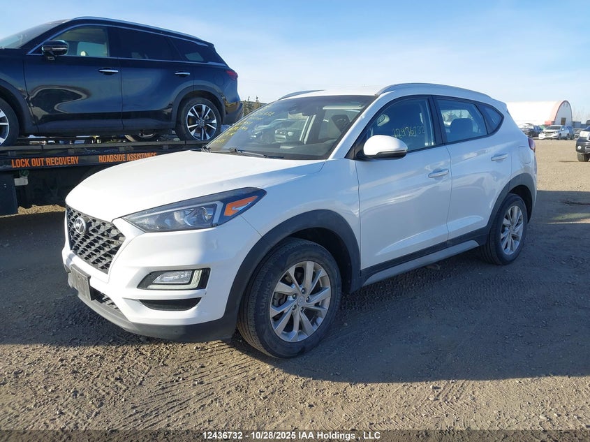 KM8J3CA41KU974611 2019 HYUNDAI TUCSON photo no. 2