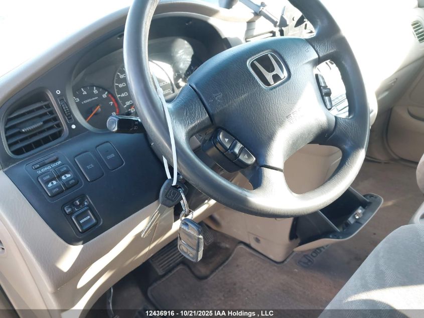 2002 Honda Odyssey Ex VIN: 2HKRL18652H010980 Lot: 12436916