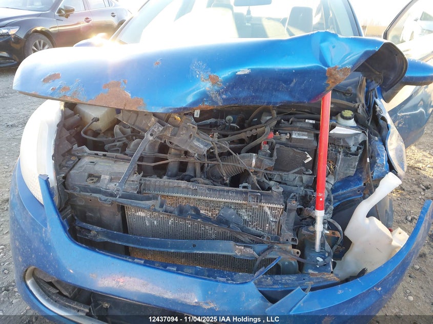 2011 Ford Fiesta S VIN: 3FADP4AJXBM104870 Lot: 12437094