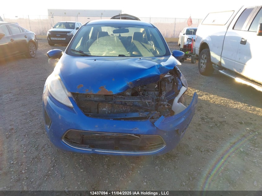 2011 Ford Fiesta S VIN: 3FADP4AJXBM104870 Lot: 12437094