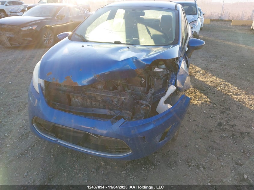 2011 Ford Fiesta S VIN: 3FADP4AJXBM104870 Lot: 12437094