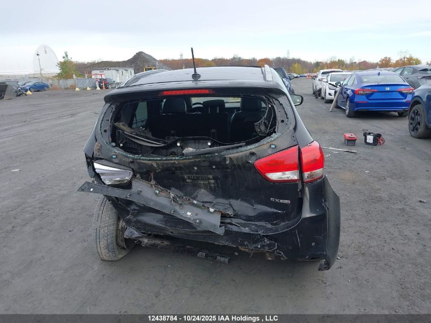 2014 Kia Rondo VIN: KNAHU8A3XE7021206 Lot: 12438784