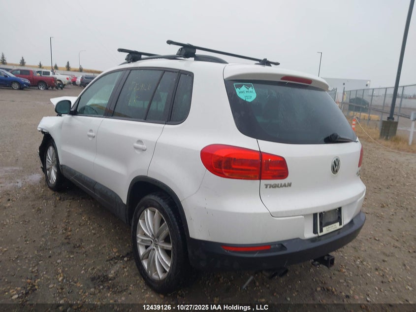 WVGJV3AX4EW516526 2014 VOLKSWAGEN TIGUAN photo no. 3