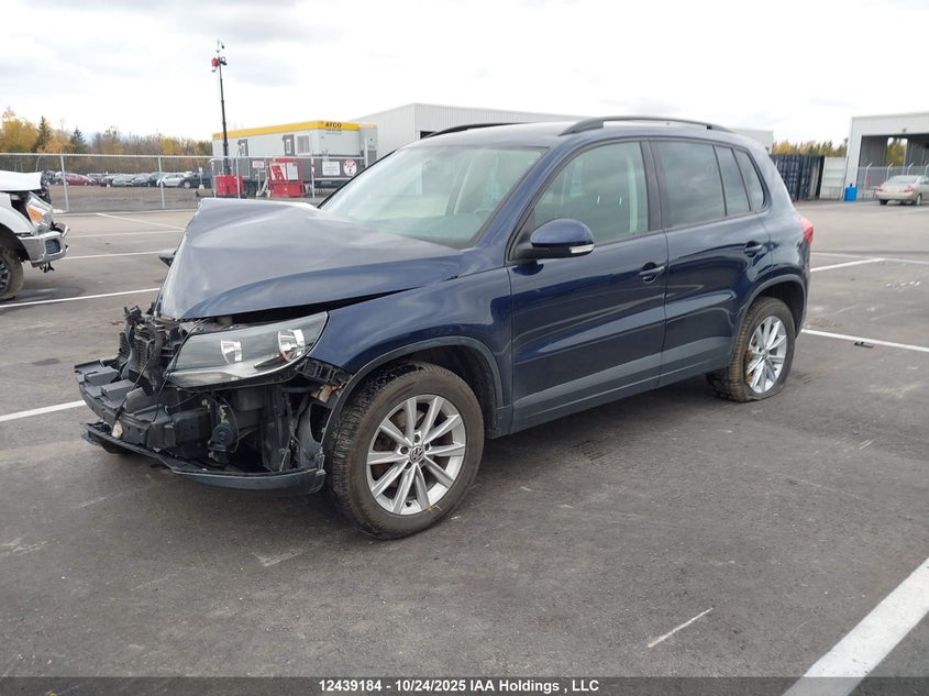 WVGJV3AX7EW505956 2014 VOLKSWAGEN TIGUAN photo no. 2