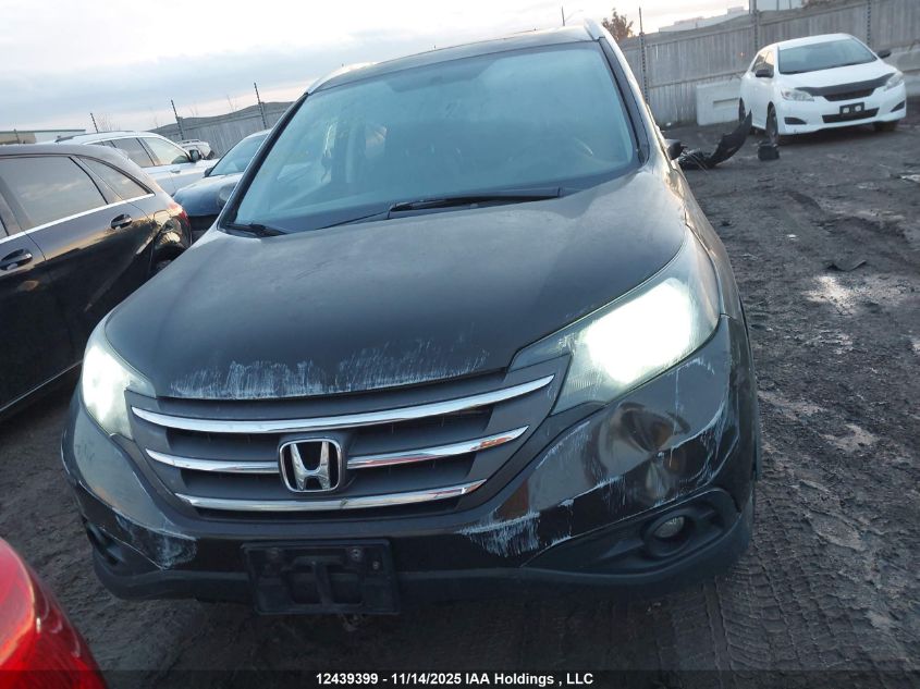 2014 Honda Cr-V Touring VIN: 2HKRM4H93EH121184 Lot: 12439399