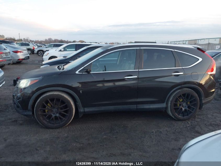 2014 Honda Cr-V Touring VIN: 2HKRM4H93EH121184 Lot: 12439399