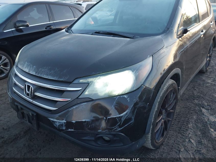 2014 Honda Cr-V Touring VIN: 2HKRM4H93EH121184 Lot: 12439399