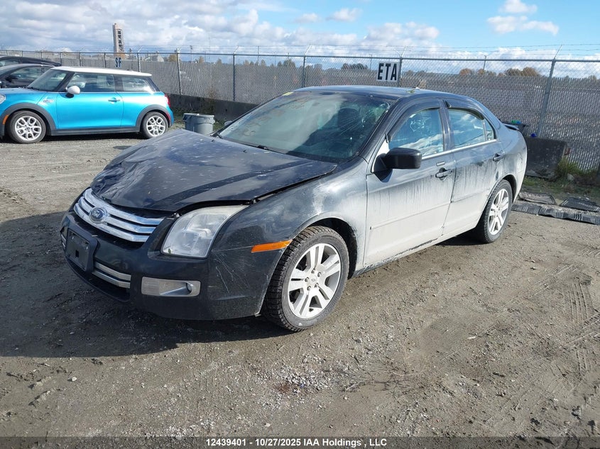 3FAHP08Z99R202758 2009 FORD FUSION photo no. 2