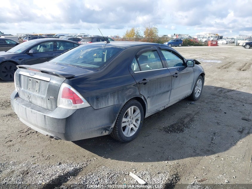 3FAHP08Z99R202758 2009 FORD FUSION photo no. 4
