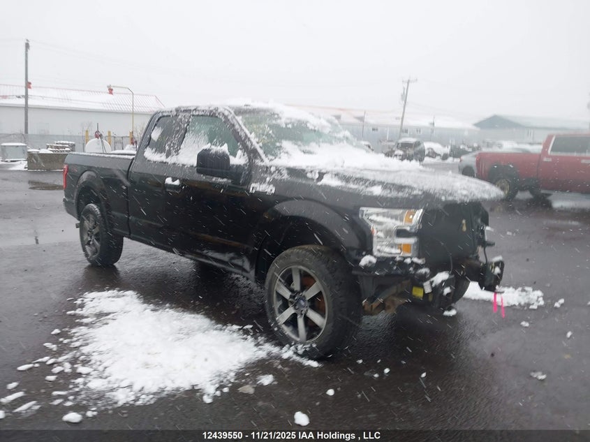 2017 Ford F-150 Xlt black pickup null 1FTEX1E86HFB37846 photo #1