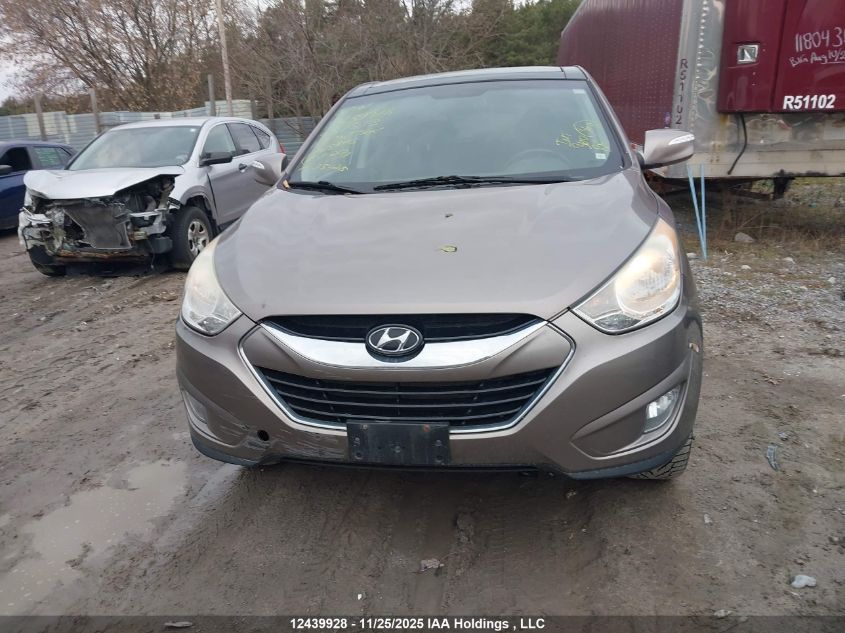 2012 Hyundai Tucson Limited VIN: KM8JUCAC4CU437513 Lot: 12439928