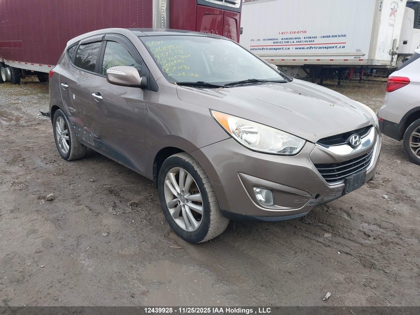 KM8JUCAC4CU437513 2012 Hyundai Tucson Limited auction photo 1