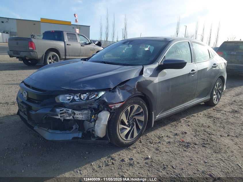 2018 Honda Civic Lx VIN: SHHFK7H35JU302302 Lot: 12440009