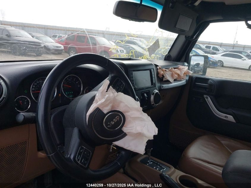 2013 Jeep Wrangler Unlimited Sahara VIN: 1C4BJWEG9DL594770 Lot: 12440259