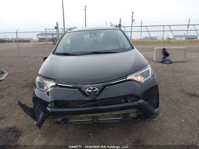 2018 Toyota Rav4 Le VIN: 2T3BFREV6JW786951 Lot: 12440777