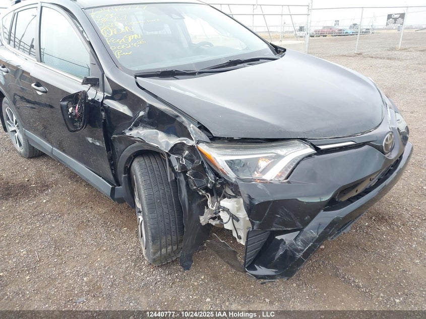 2018 Toyota Rav4 Le VIN: 2T3BFREV6JW786951 Lot: 12440777