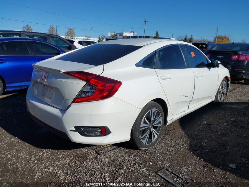 2HGFC1F43JH105731 2018 HONDA CIVIC photo no. 4