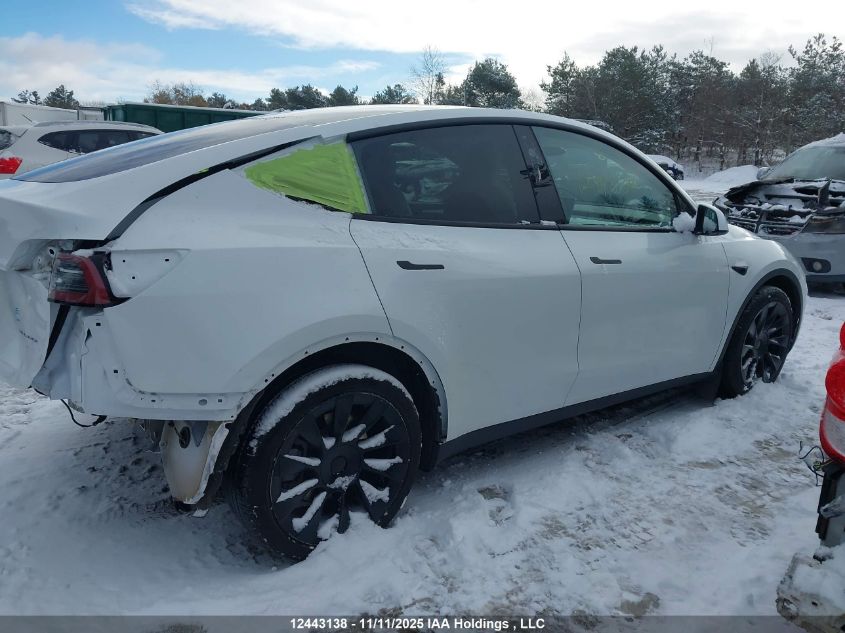 2024 Tesla Model Y Long Range VIN: 7SAYGDEEXRF991087 Lot: 12443138