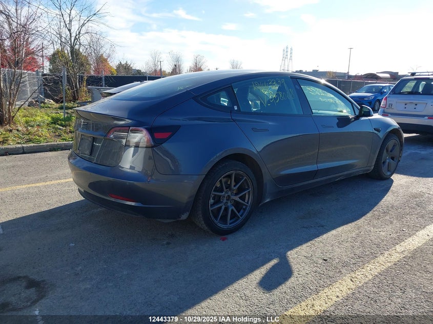 5YJ3E1EA1NF258008 2022 TESLA MODEL 3 photo no. 4