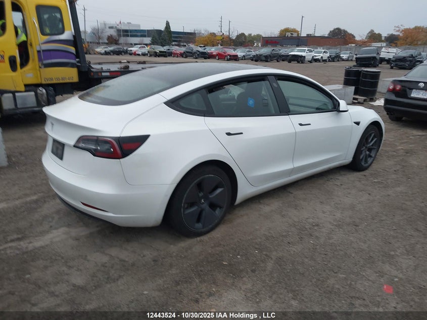 5YJ3E1EA9NF161011 2022 TESLA MODEL 3 photo no. 4