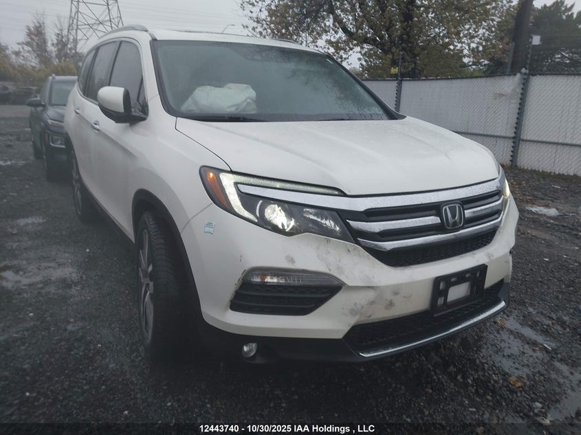 2018 Honda Pilot Touring VIN: 5FNYF6H92JB502616 Lot: 12443740