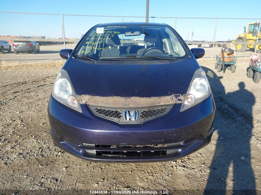 2009 Honda Fit Lx VIN: JHMGE87579S811133 Lot: 12443838