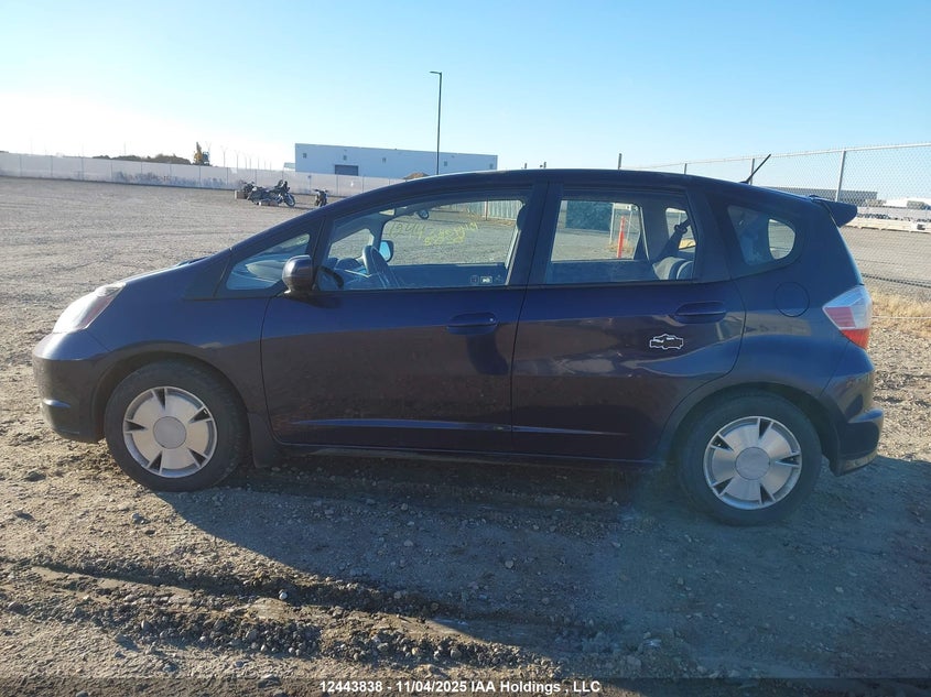 2009 Honda Fit Lx VIN: JHMGE87579S811133 Lot: 12443838