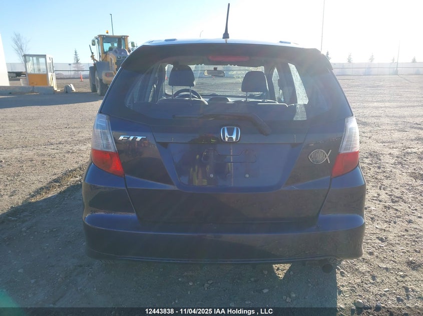 2009 Honda Fit Lx VIN: JHMGE87579S811133 Lot: 12443838
