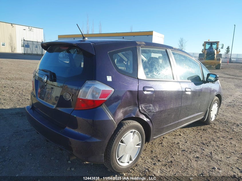 2009 Honda Fit Lx VIN: JHMGE87579S811133 Lot: 12443838