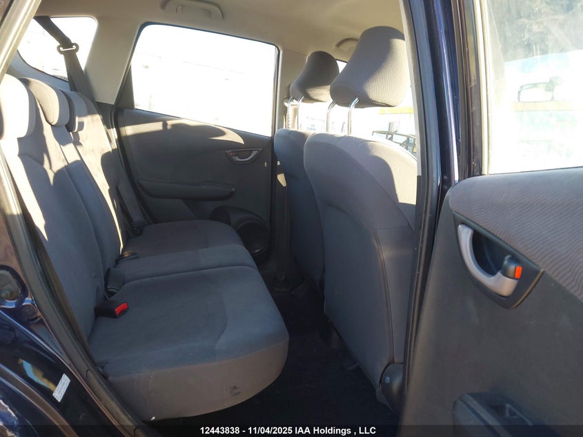 2009 Honda Fit Lx VIN: JHMGE87579S811133 Lot: 12443838