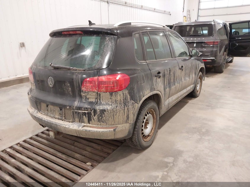 WVGJV7AX0DW524970 2013 VOLKSWAGEN TIGUAN photo no. 4