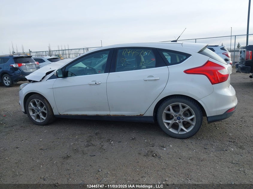 2012 Ford Focus Titanium VIN: 1FAHP3N20CL198565 Lot: 12445747