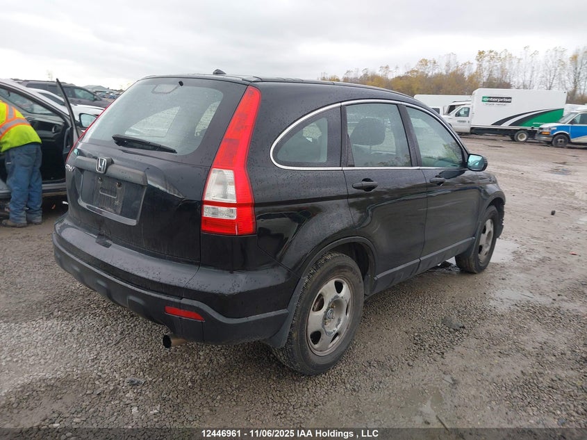 5J6RE38399L800097 2009 HONDA CR-V photo no. 4